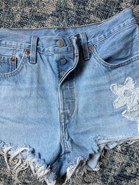 Levi’s Buttonfly Cutoff Shorts with Floral Patch
